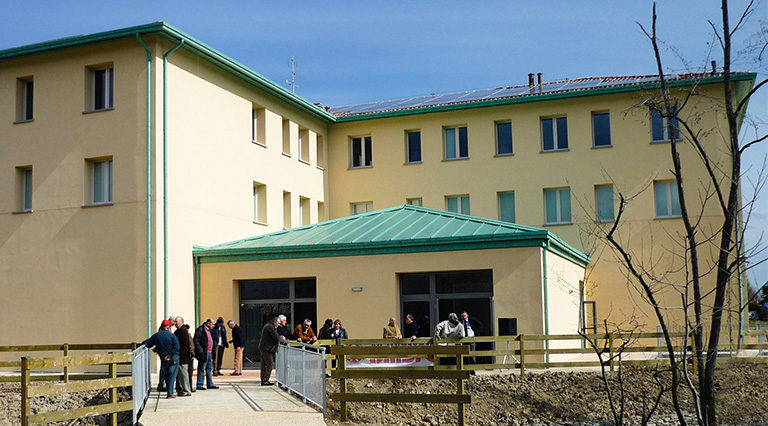 Edificio residenziale con attività commerciali a Pontenovo, Binini Partners, Società di architettura e ingegneria